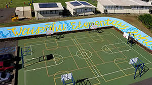 Team Serve Paints Waipahu Elementary Basketball Court for New Mural